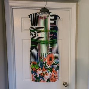 Modern floral print fitted dress.